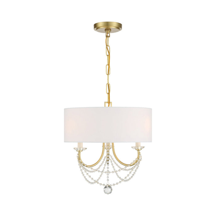 Delilah Mini Chandelier in Aged Brass.