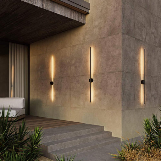 Midnight Indoor/Outdoor LED Wall Light in Outside Area.