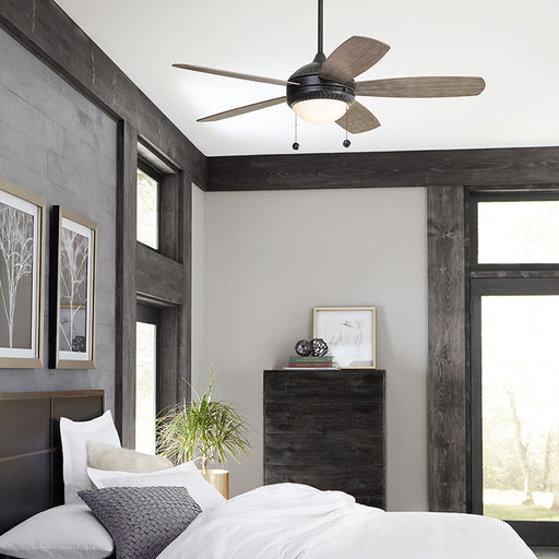 Discus Ornate LED Ceiling Fan in bedroom.