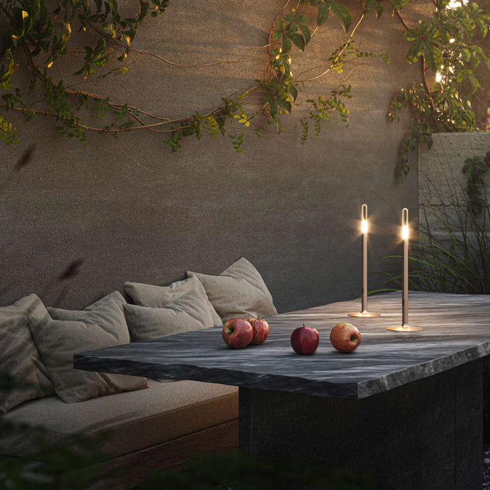 Glim Outdoor LED Portable Table Lamp in Outside Area.