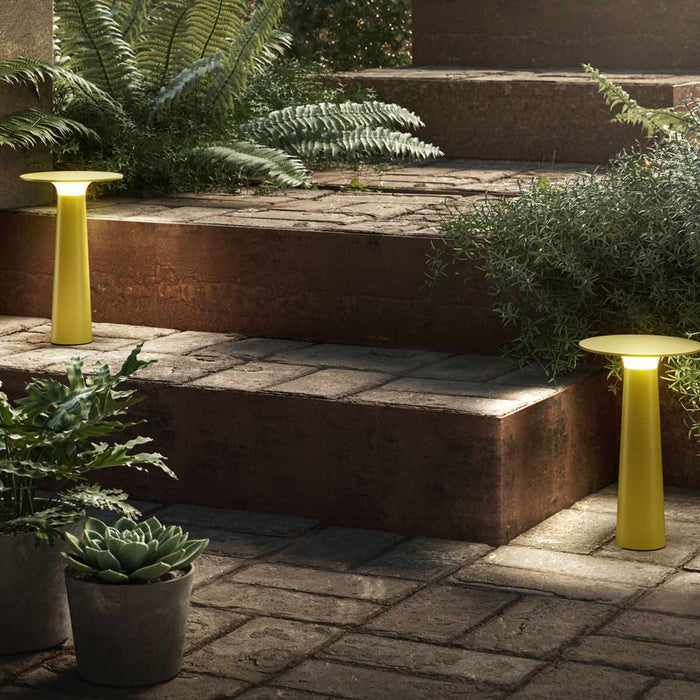 Lix Outdoor LED Portable Table Lamp in Outside Area.