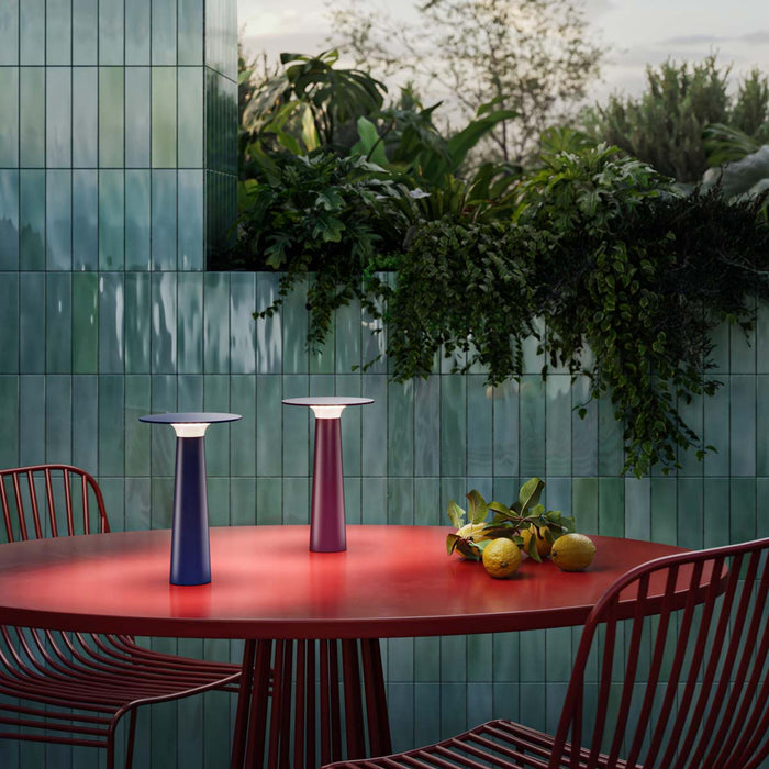 Lix Outdoor LED Portable Table Lamp in Outside Area.