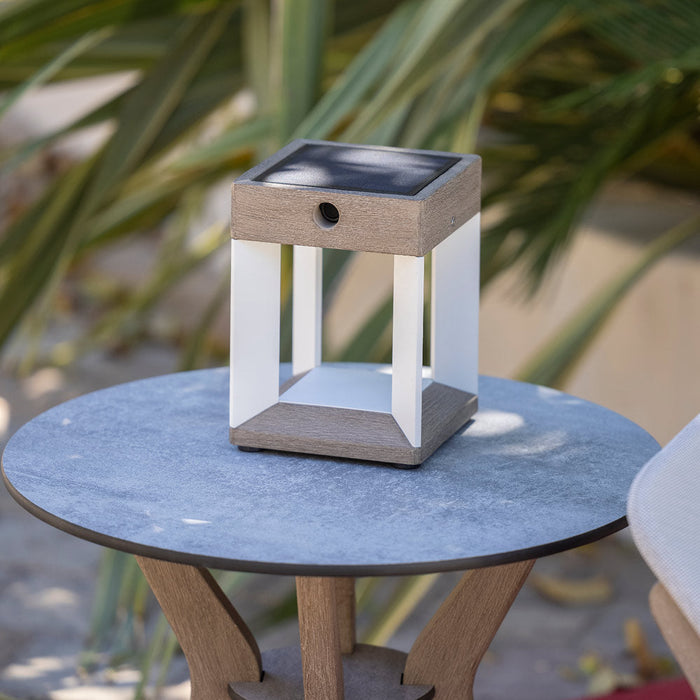 Blade Outdoor Solar LED Table Lamp in Outside Area.