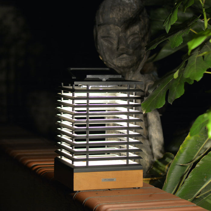 Tekura Outdoor Solar LED Table Lamp in Outside Area.