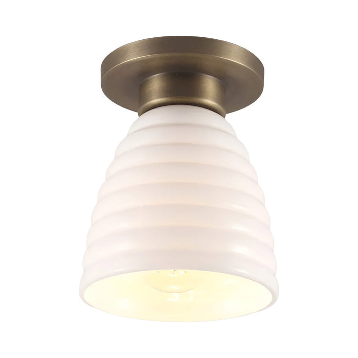 Hector Bibendum Flush Mount Ceiling Light in Antique Brass.