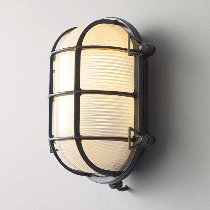 Oval Brass Bulkhead Indoor/Outdoor Wall Light in Detail.