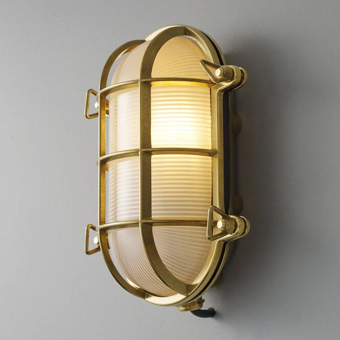 Oval Brass Bulkhead Indoor/Outdoor Wall Light in Detail.