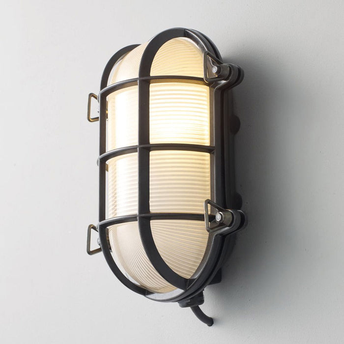 Oval Brass Bulkhead Indoor/Outdoor Wall Light in Detail.