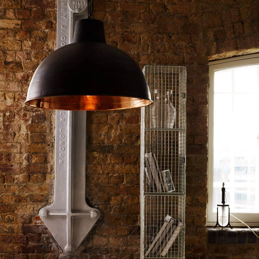 Spun Reflector Pendant Light in living room.