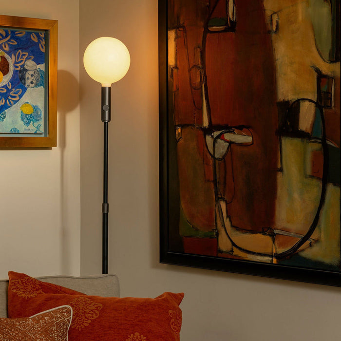 Poise Sphere V LED Adjustable Floor Lamp in living room.