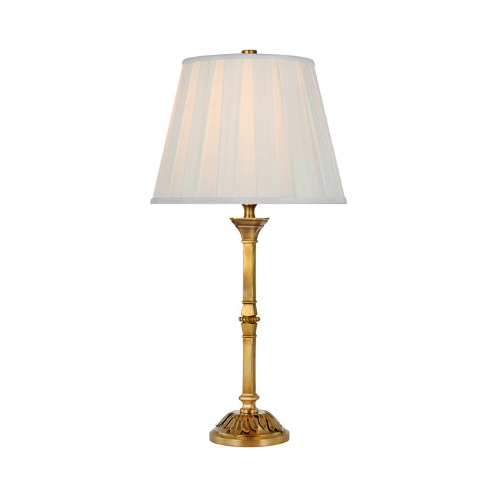 Doris Table Lamp in Natural Brass.