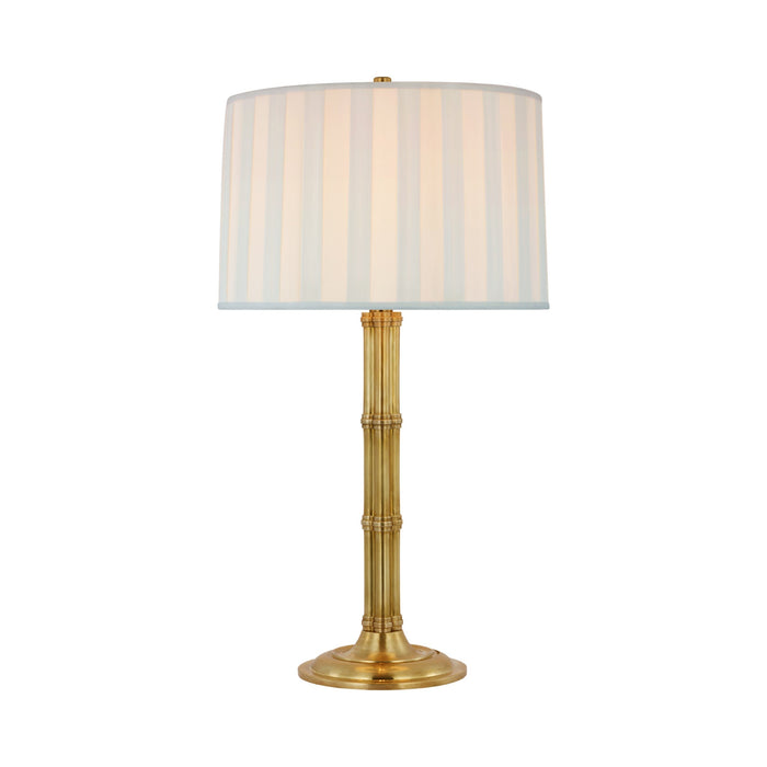 Downing Table Lamp in Natural Brass.