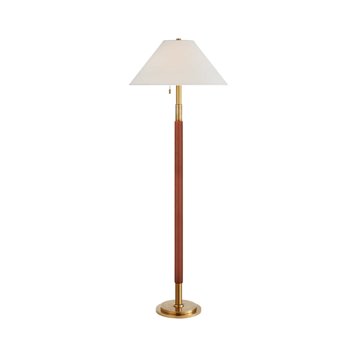 Garner Floor Lamp in Natural Brass/Saddle Leather.