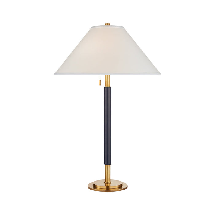 Garner Table Lamp in Natural Brass/Navy Leather.