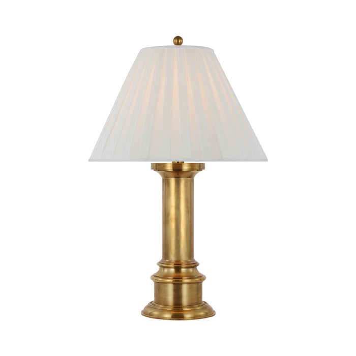 Hammett Table Lamp in Natural Brass.