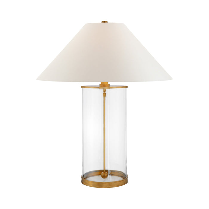 Modern Table Lamp in Natural Brass.