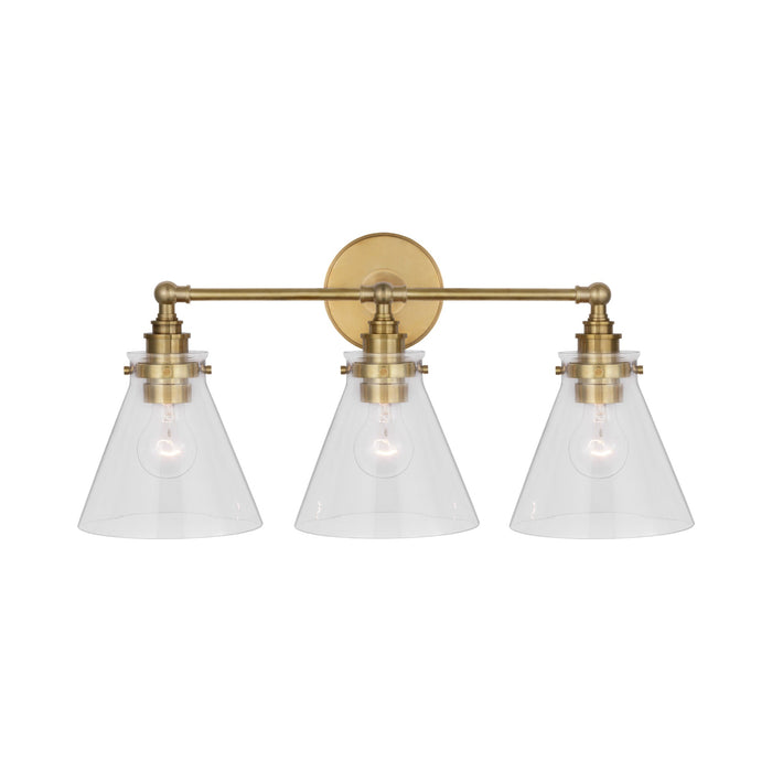 Parkington Bath Wall Light in Antique-Burnished Brass (3-Light/Clear Glass).