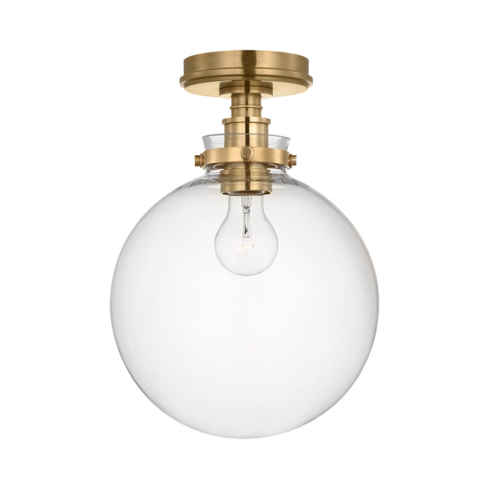 Parkington Globe Flush Mount Ceiling Light in Antique-Burnished Brass (Clear Glass).