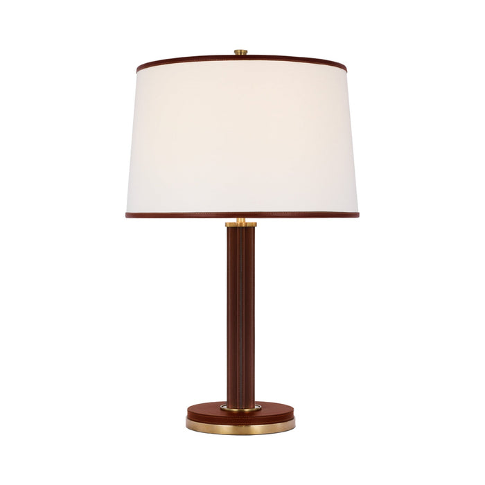 Riley Table Lamp in Natural Brass/Saddle Leather.