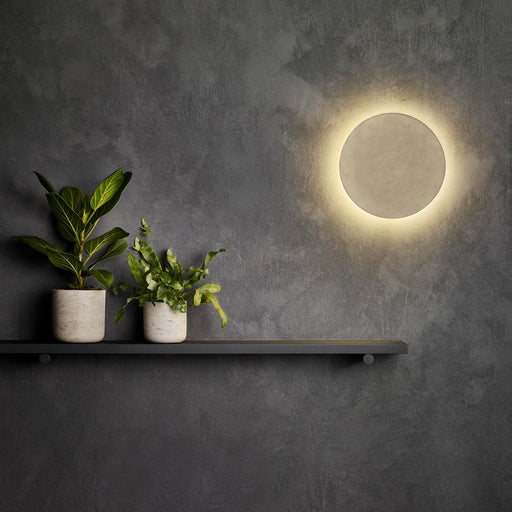 Eclipse Concrete LED Wall Light in living room.