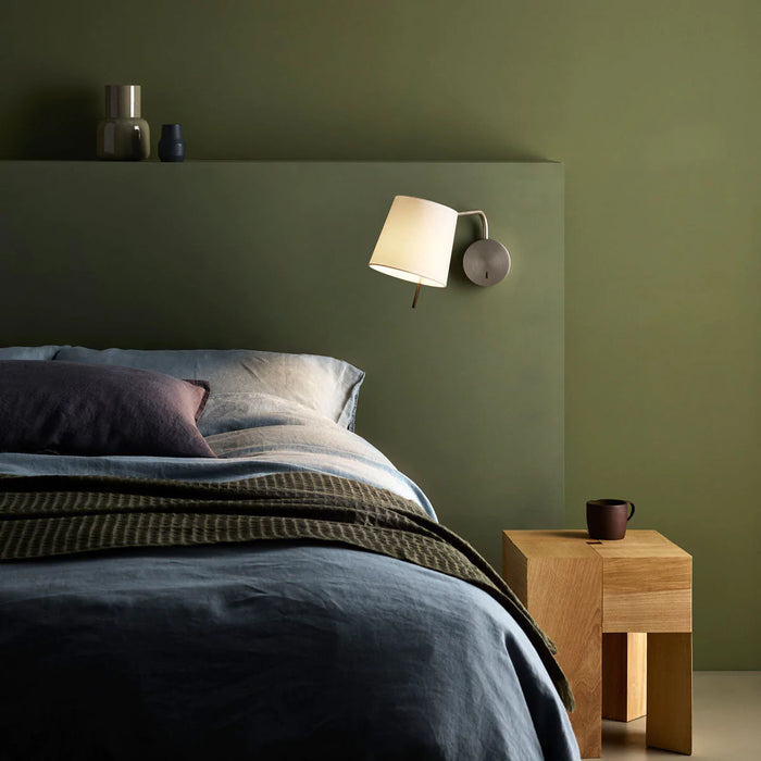 Mitsu LED Swing Arm Wall Light in bedroom.