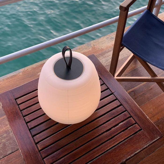 Misko Camp LED Table Lamp in Outside Area.