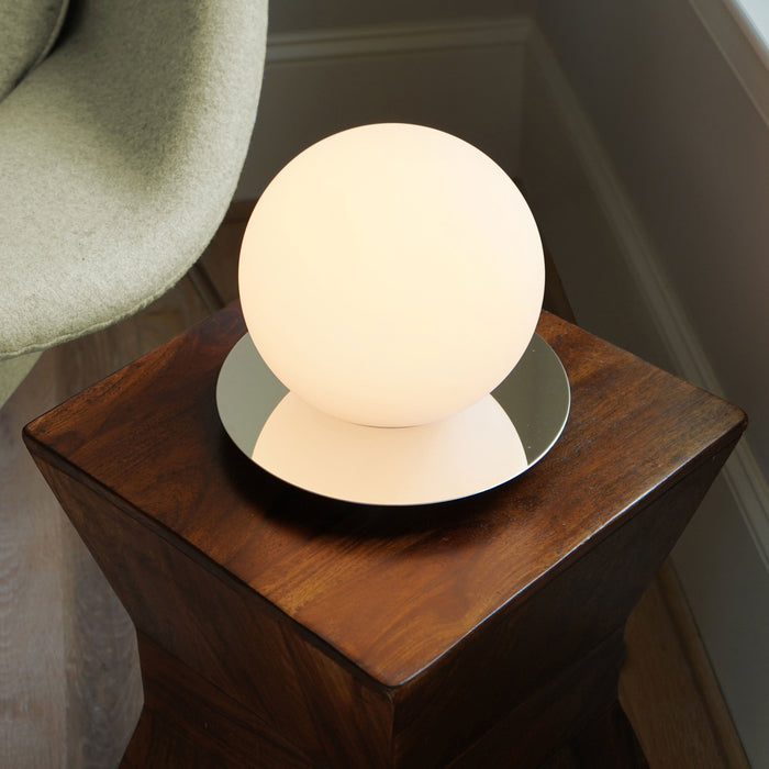 Bola Sphere LED Table Lamp in living room.