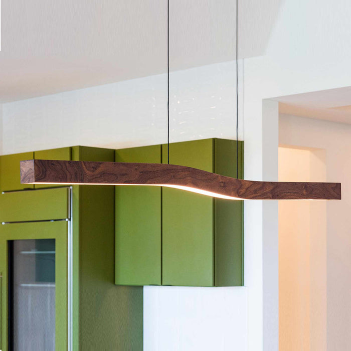 Camur LED Linear Pendant Light in dining room.