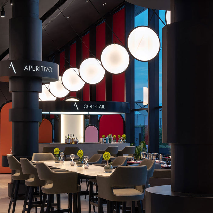 Discovery LED Vertical Suspension Light in restaurant.