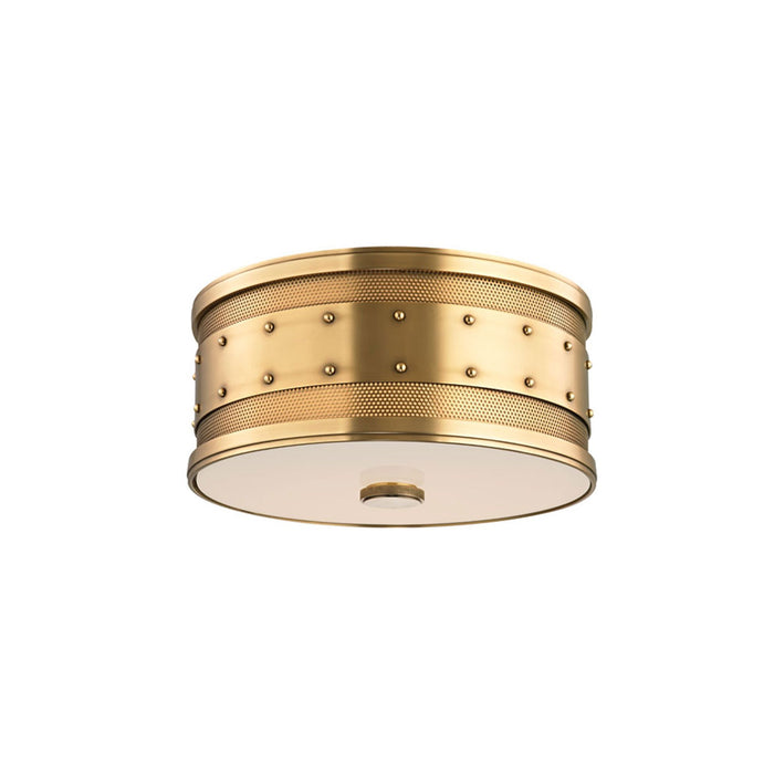 Gaines Flush Mount Ceiling Light in Aged Brass.