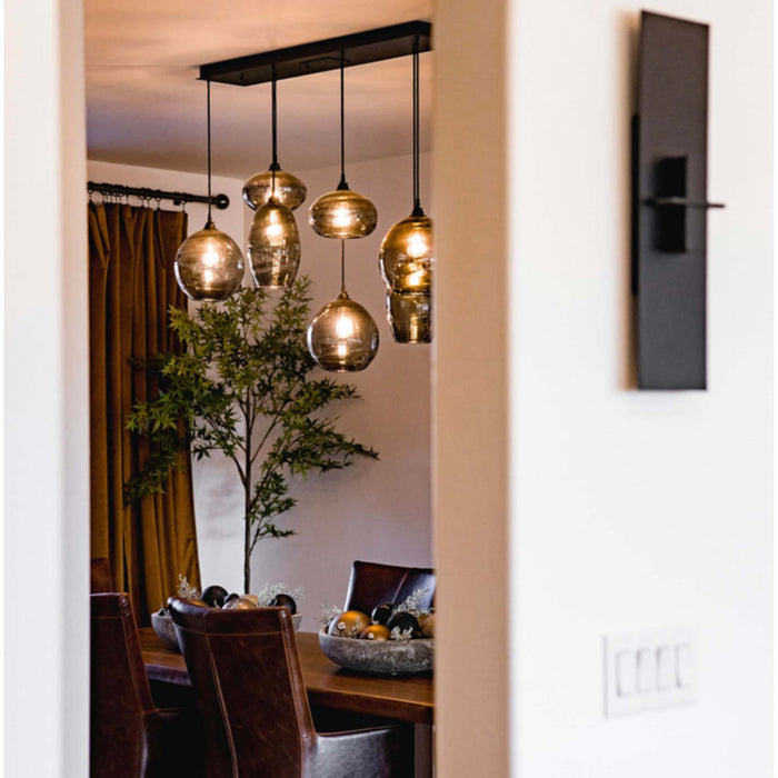 Misto Linear Pendant Light in dining room.