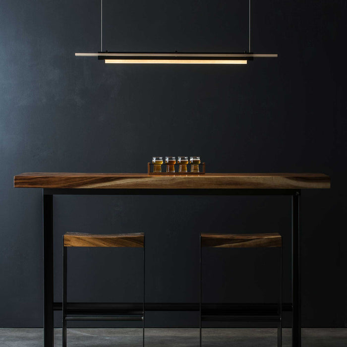 Plank LED Pendant Light in dining room.