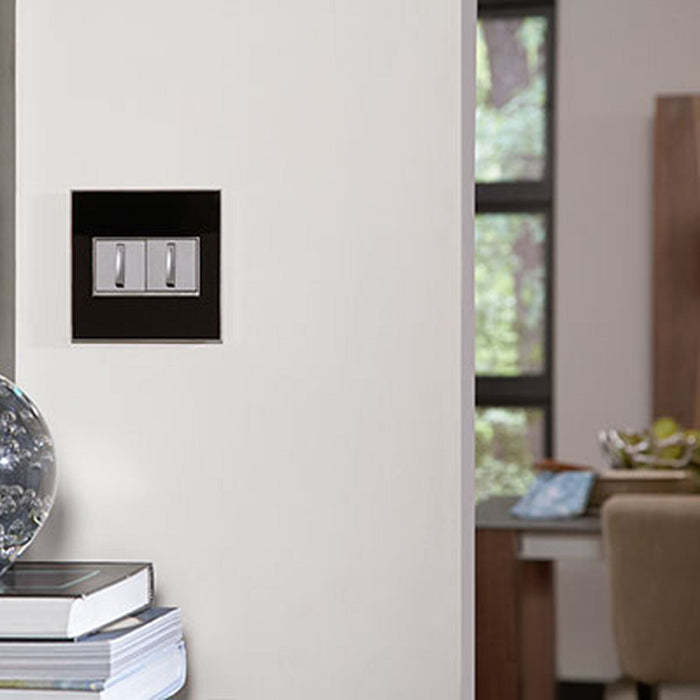 adorne® Cast Metals Wall Plate in living room.