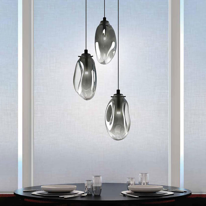 Liquid LED Multi Light Pendant Light in dining room.