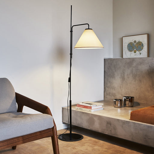 Funiculi Floor Lamp with Fabric Shade in living room.