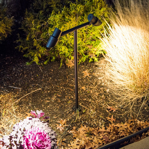 Mini Double Accent LED Path Light in outside area.