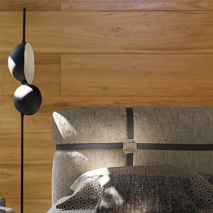 Superluna LED Floor Lamp in bedroom.