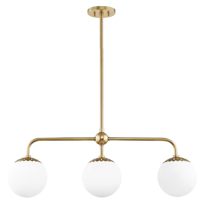 Paige Linear Suspension Light in Aged Brass.