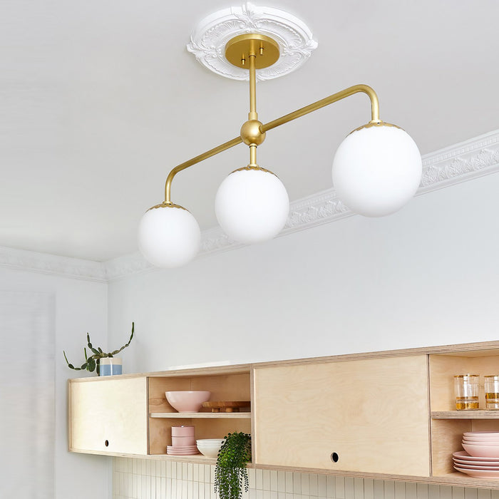 Paige Linear Suspension Light in living room.