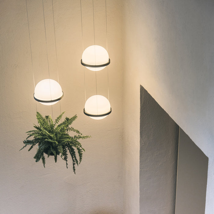 Palma Planter LED Pendant Light in lobby.