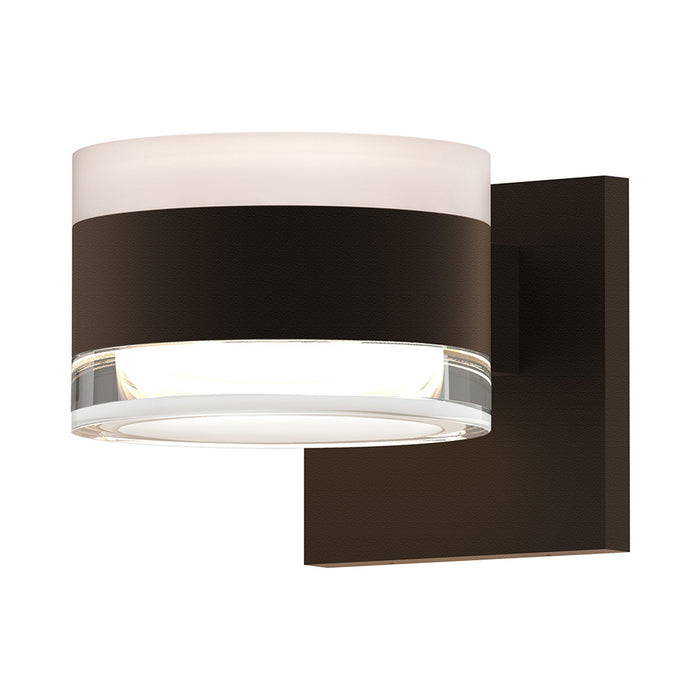 Reals Up/Down Outdoor LED Wall Light in Textured Bronze/White Cylinder Lens/Clear Cylinder Lens.