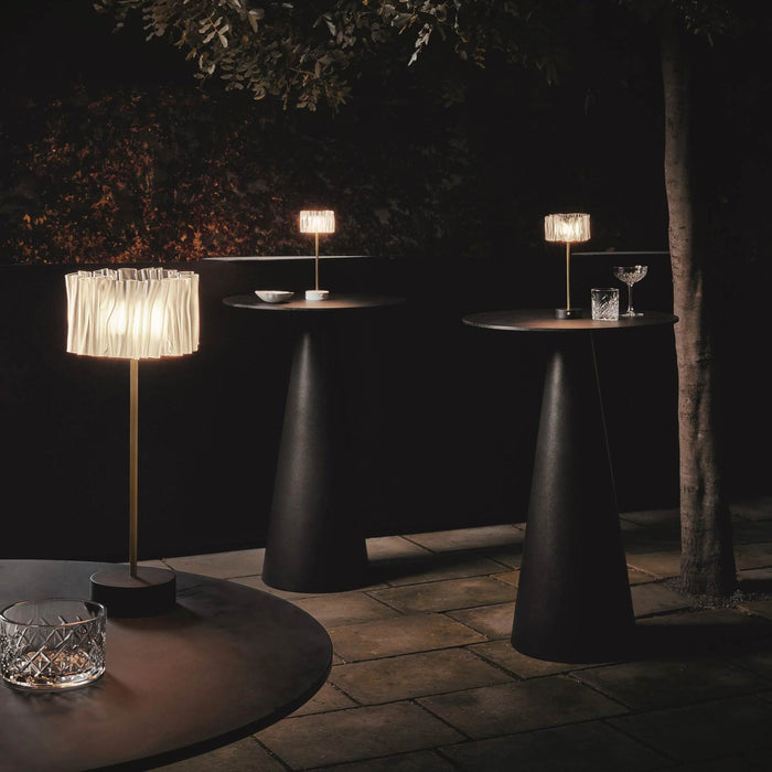 Accordeon Battery LED Table Lamp in Outdoor Area.