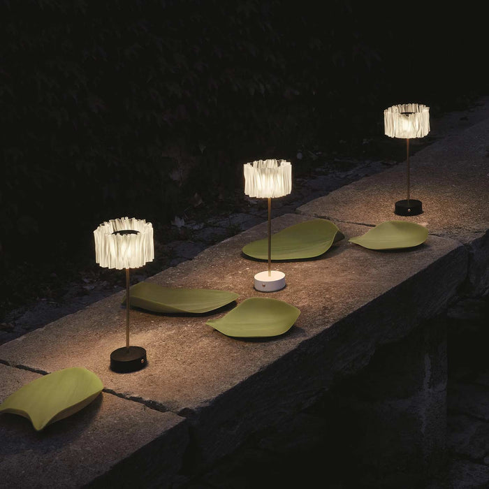 Accordeon Battery LED Table Lamp in Outdoor Area.