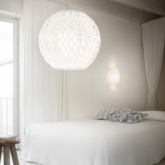 Charlotte Globe LED Pendant Light in bedroom.