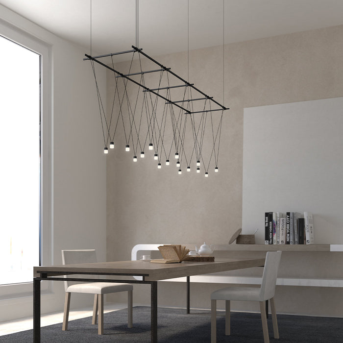 Suspenders® Gridscape LED Pendant Light in dining room.