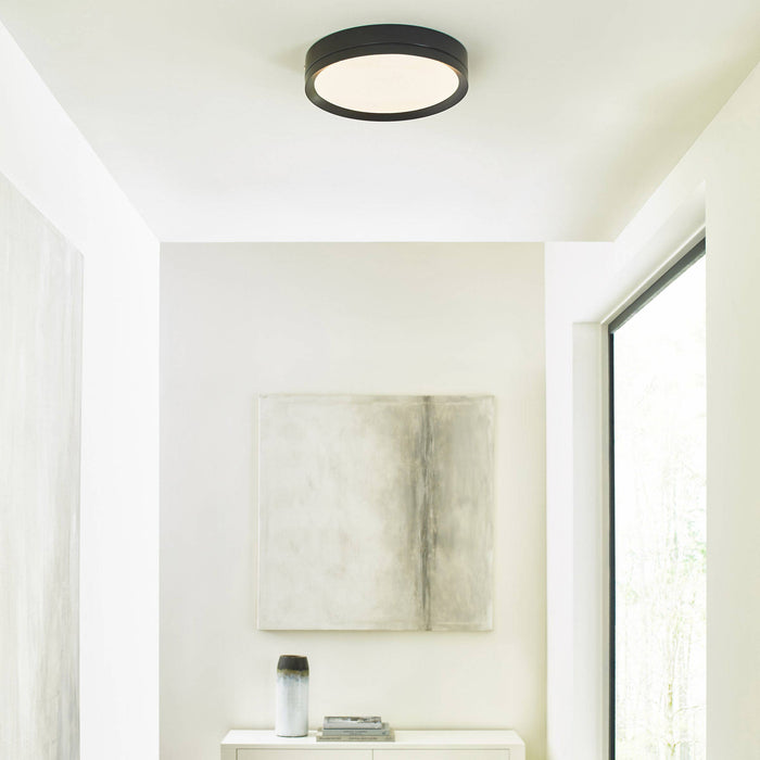 Finch Round LED Flush Mount Ceiling Light in bathroom.