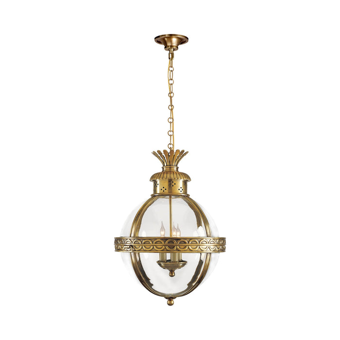 Crown Globe Pendant Light in Antique-Burnished Brass.