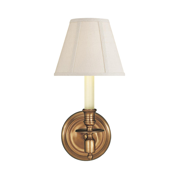 French Wall Light in Hand-Rubbed Antique Brass/Linen Shade.