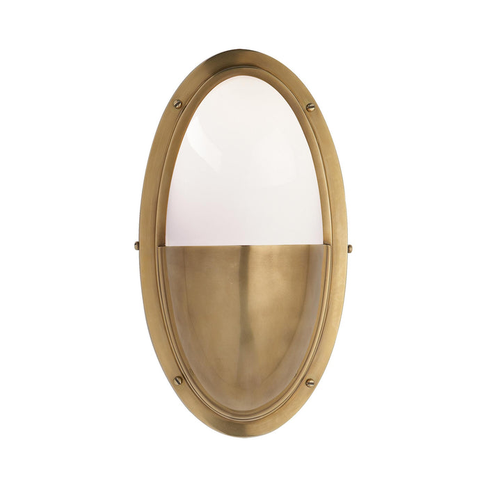 Pelham Oval Wall Light in Hand-Rubbed Antique Brass.
