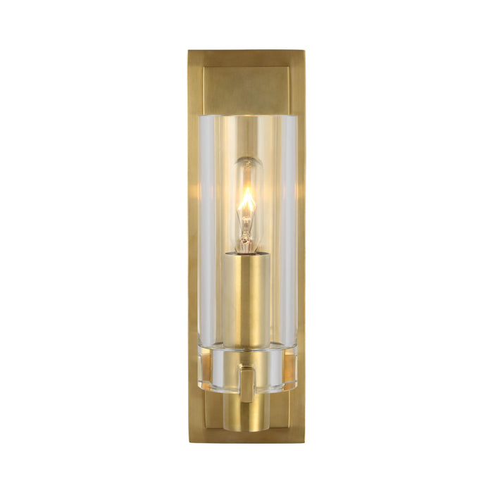 Sonnet LED Wall Light in Antique-Burnished Brass/Clear Glass.